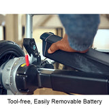 A close-up of a hand removing the battery from the Journey Zoomer Lightweight Folding Power Chair, with the caption “Tool-Free, Easily Removable Battery” below.