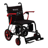 The Journey Air Elite Lightweight Folding Power Chair features a black and red design, padded seat, right-arm joystick control, large rear and small front wheels, footrest, and visible Journey branding on the seat and footrest. It is easy to fold and lightweight.