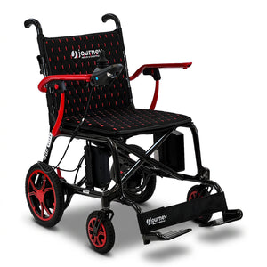 The Journey Certified Pre-Owned Air Elite Lightweight Power Chair in red and black features joystick control, a padded seat, footrests, and large rear wheels—ideal as a travel mobility chair for easy transportation.