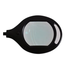 The Journey™ 5X Floor Magnifying Glass with LED Light features a rectangular lens, a built-in handle, and a frame button to activate its bright LED—ideal for hands-free close-up viewing in low-light settings.