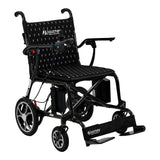 The Journey Air Elite Lightweight Folding Power Chair is black, lightweight, foldable, with a joystick armrest control, padded seat bearing the Journey logo, large rear wheels, and convenient footrests.