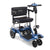 A Journey So Lite® Folding Power Scooter in blue, featuring a black cushioned seat and backrest, handlebars, four wheels, a front basket under the seat, and Electronic Stability Control technology. Journey is printed on the backrest.