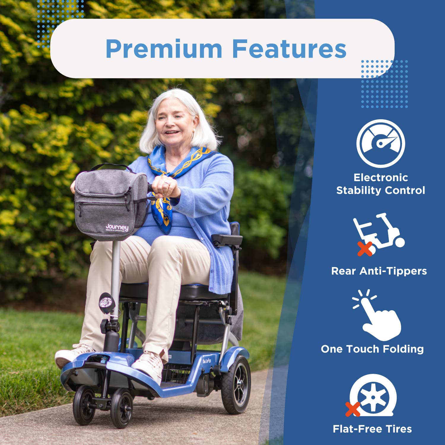 An older woman smiles while riding a Journey So Lite Folding Power Scooter on a sidewalk. Beside her, features are listed: electronic stability control, rear anti-tippers, one-touch folding, and flat-free tires.