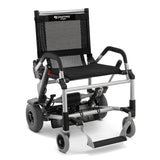 A lightweight, foldable CPO - Zinger® Folding Power Chair with black mesh seat and backrest, silver frame, large rear wheels, small front wheels, footrest, and visible Zinger branding on the backrest.