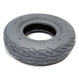 The Journey Zinger Power Chair Rear Tire Replacement is a new black rubber tire with visible tread and sidewall markings, photographed on a white background—ideal for use as a power chair replacement tire.