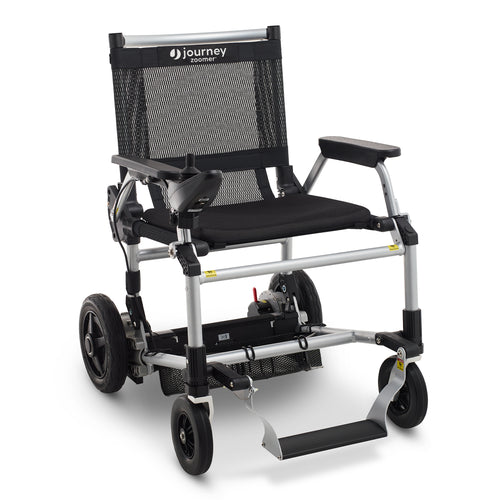 The Journey Zoomer® Lightweight Folding Power Chair features a black mesh seat and backrest, sturdy armrests, large rear wheels, small front wheels, and an all-terrain design for comfort and versatility.