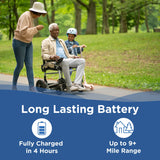 An older man sits in a Journey Zoomer Lightweight Folding Power Chair on a park path, joined by a smiling woman and a child on a scooter. Text highlights its long-lasting battery—fully charged in 4 hours for up to 9+ mile range.
