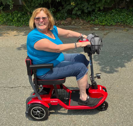 Journey Health customer riding portable mobility scooter