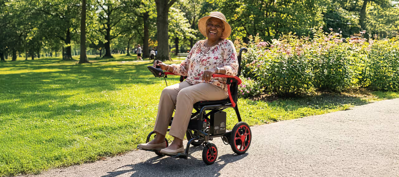 Woman using Journey Health mobility scooter in park beside buyer's guide email signup form