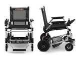 Journey Zoomer lightweight folding power chair shown in front and side views, highlighting the seat, footrest, frame structure, wheels, and armrest joystick for compact folding and portability.