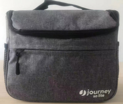 The Journey So Lite Power Scooter Front Bag Replacement features gray fabric, a front zipper pocket, black top handle, and the journey so lite logo in white—ideal as a mobility scooter or replacement front bag.
