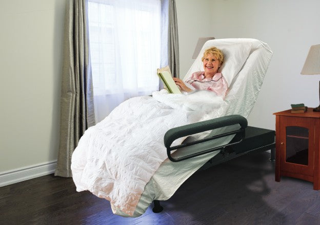 Woman using UPbed to read in sitting position