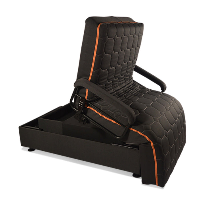 The UPbed® Standard 4-in-1 Motorized Lift Bed, shown partially upright, features black quilted upholstery with orange trim, cushioned armrests, and functions as a chair or adjustable bed.