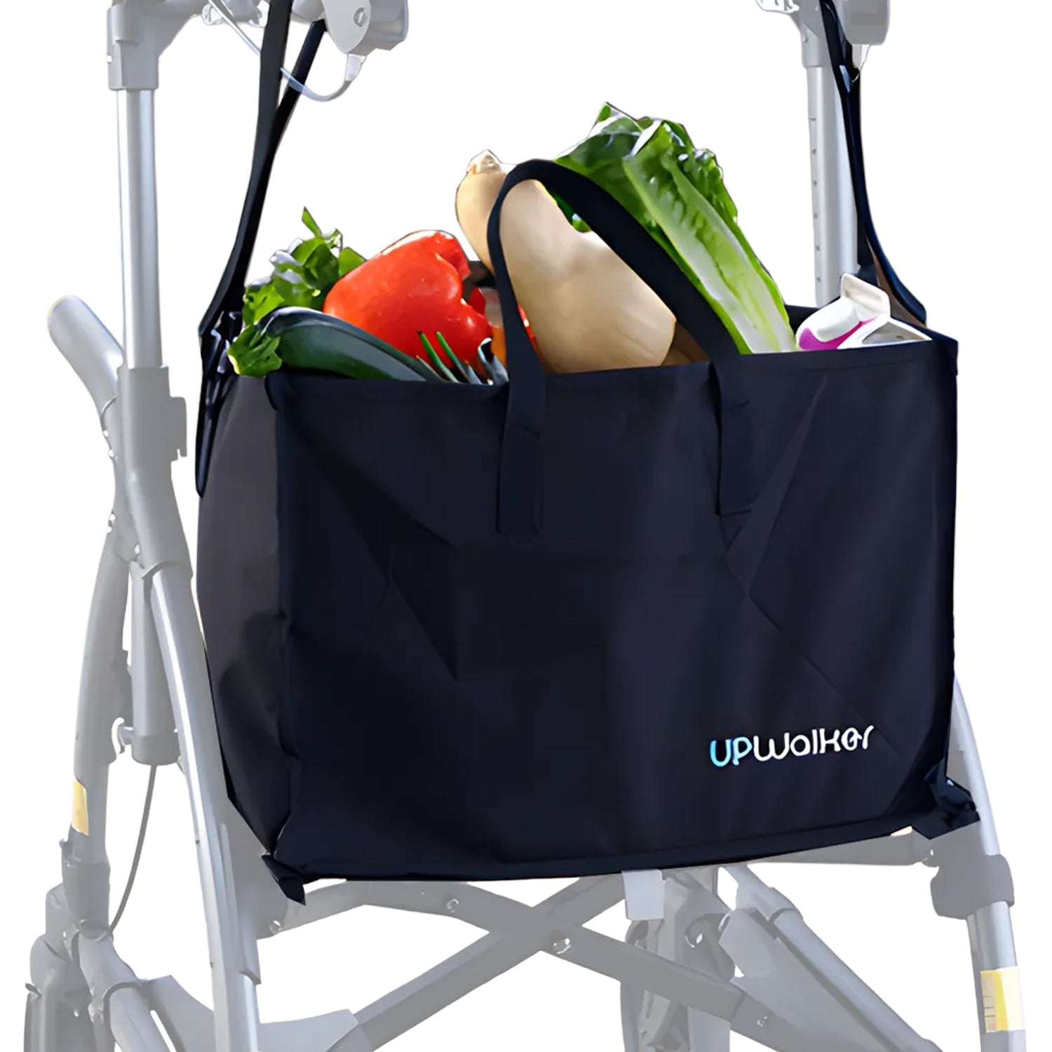 The Journey UPWalker Personal Shopping Bag, a black walker accessory, is securely attached to a walker frame and filled with groceries such as vegetables and cartons.