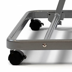 Close-up of a gray metal frame with black caster wheels on a white studio background.