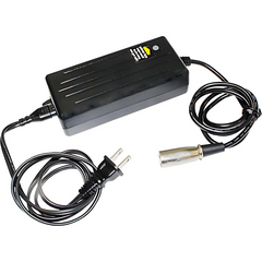 The Journey Zinger Replacement Battery Charger w/Power Wire features a black design with a standard two-prong plug and a circular metal connector, joined by a power wire, displayed on a white background.