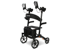 An Open Box So Lite® Glide Backsaver Rollator Walker in black features four wheels, ergonomic forearm supports, hand brakes, a padded seat, and a storage bag. The certified pre-owned Journey branding is visible on the walker and bag.