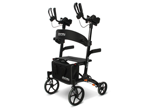 An Open Box So Lite® Glide Backsaver Rollator Walker in black features four wheels, ergonomic forearm supports, hand brakes, a padded seat, and a storage bag. The certified pre-owned Journey branding is visible on the walker and bag.